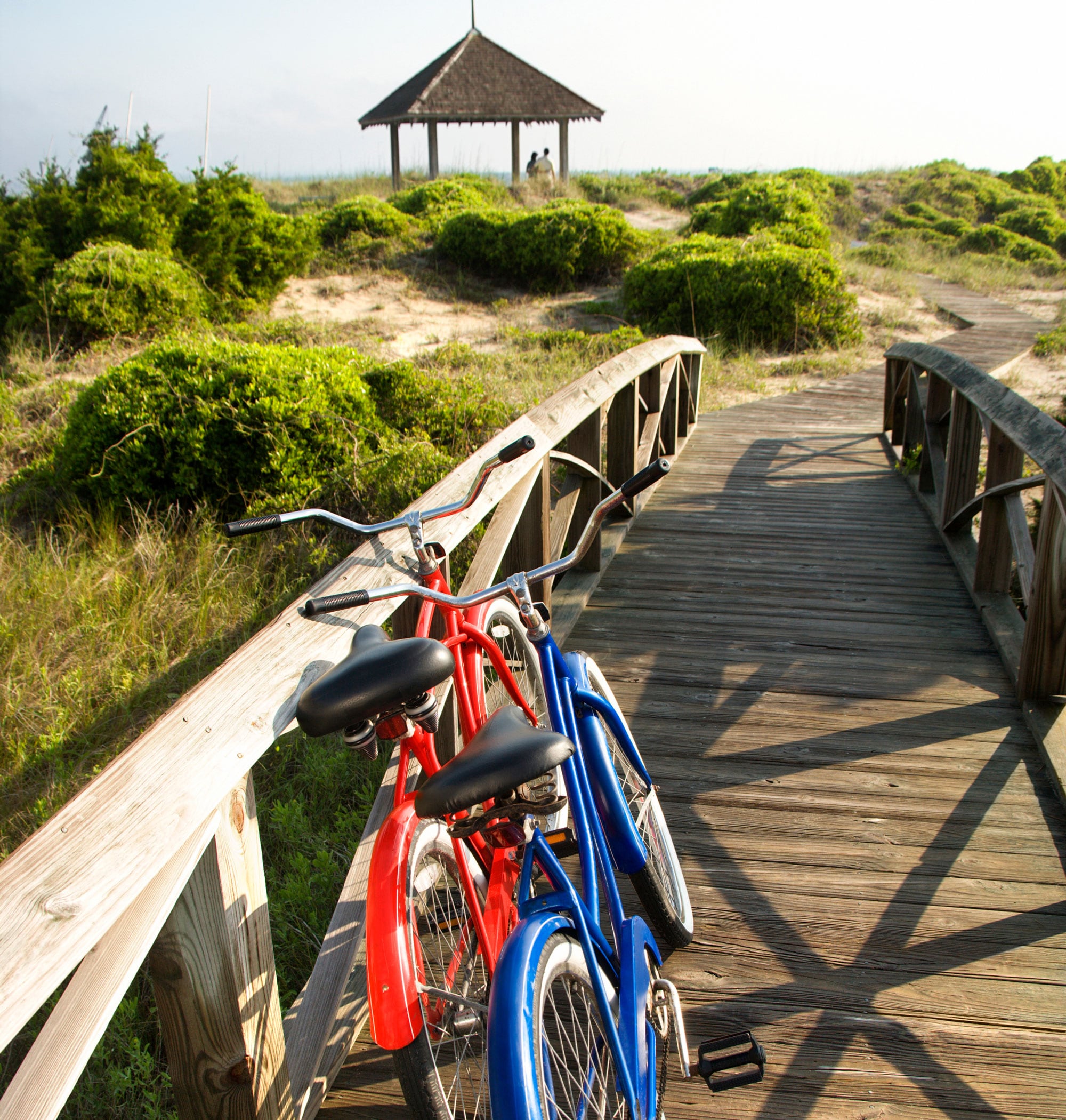 Bicycles on wood ramp to beach